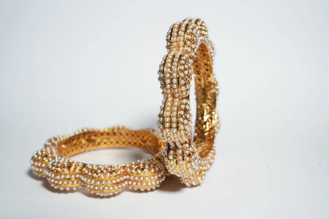 Gold and pearl beaded bangles
